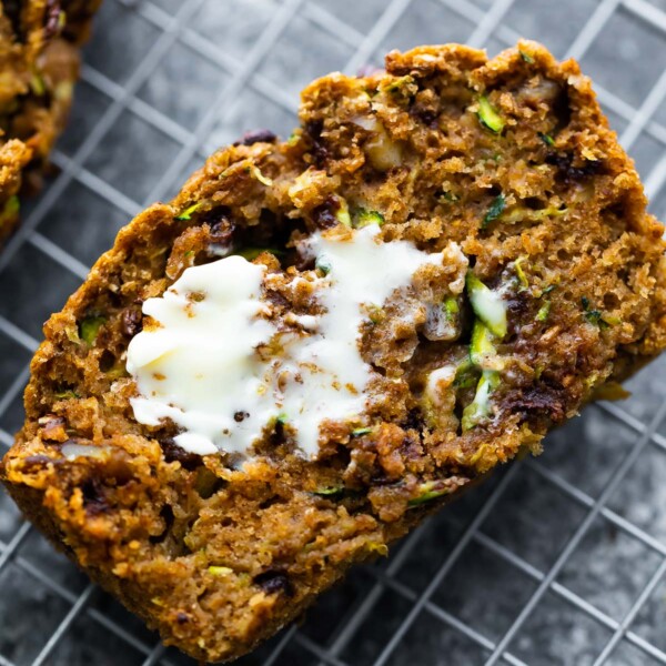 close up shot of zucchini bread slice with butter on it